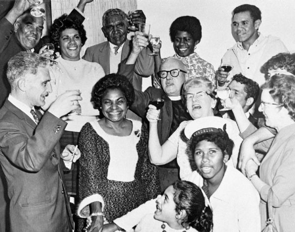 Members of the NSW Vote YES committee toast their campaign director, Faith Bandler(front, second from left), after the success of the 1967 Referendum. Hans Bandler to her right, Lilon Bandler in front. Bert Groves is directly behind Faith Bandler. Harriet Ellis is behind Hans Bandler. Edna Blackshaw is on Faith Bandler's left and Rev. Alf Clint is behind her on the right.