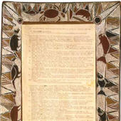 A detail of the upper left corner of the Yirrkala bark petition. An elaborate design around the edges with the petition in the centre.